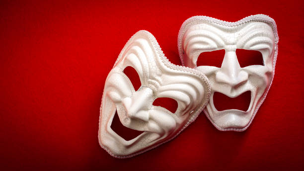 istock Comedy and Tragedy theatrical masks 643538744