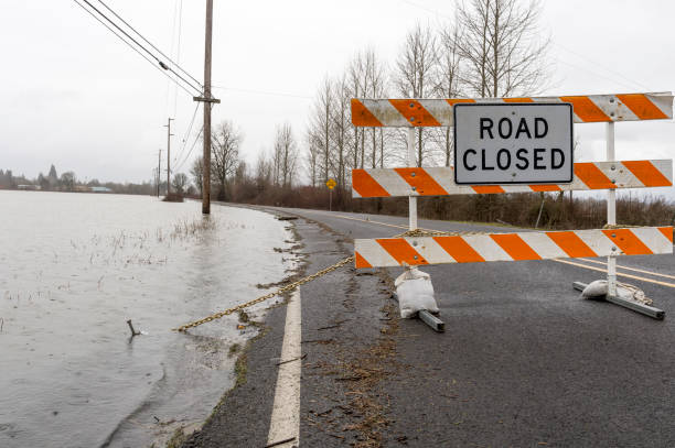 istock Road Closed Sign Chained Barricade for Flood Water 643538772