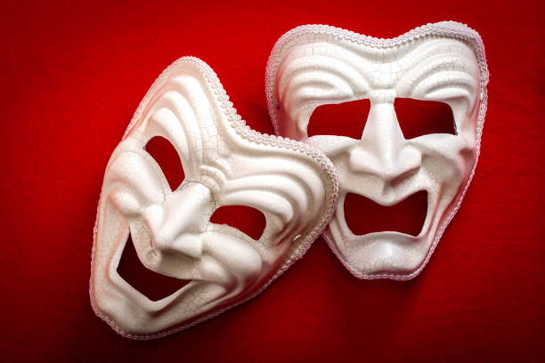 istock Comedy and Tragedy theatrical masks 643538972
