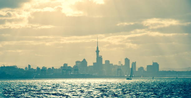 Waitemata Harbour Auckland Harbour View A view of the Waitemata Harbour in the Auckland Region of New Zealand/ Aotearoa's North Island from the sea at Dusk. Waitemata Harbor stock pictures, royalty-free photos & images