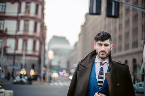 istock Gentleman in suit on the street 643545132