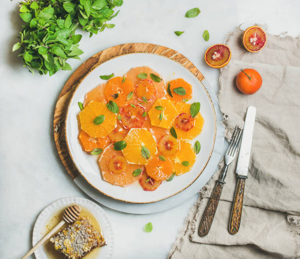 istock Fresh mixed citrus fruit salad with mint and honey 643563196