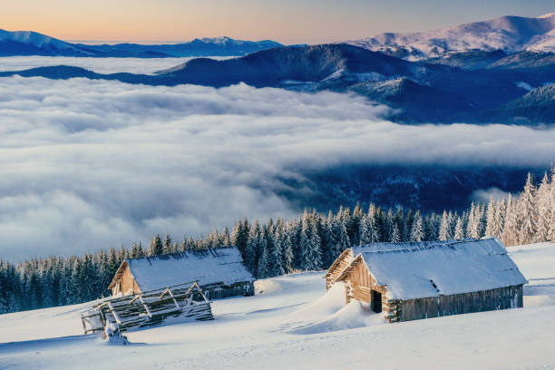 istock chalets in the mountains at sunset 643567088