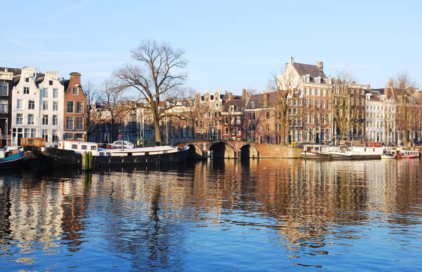 istock Houses Reflections on the Amstel River 643574232
