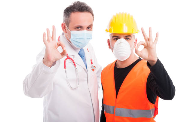istock Doctor and constructor showing okay all right gesture 643578568