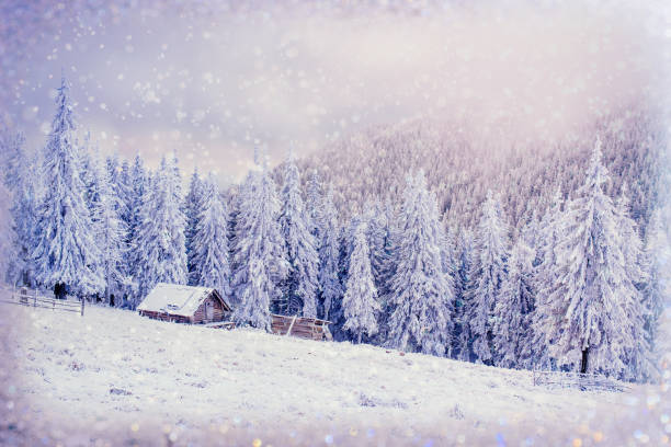 istock chalets in the mountains at sunset. Winter greetings 643578628