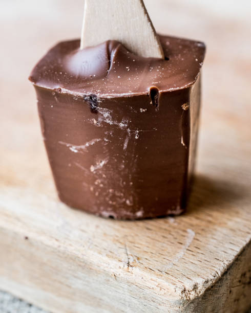 istock Milky Chocolate with wooden stick. 643579076