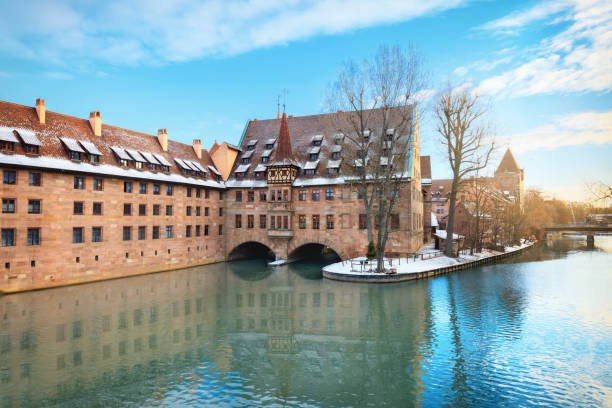 Winter landscape of The Hospital of the Holy Spirit on Pegnitz river in Nuremberg, Bavaria, Germany