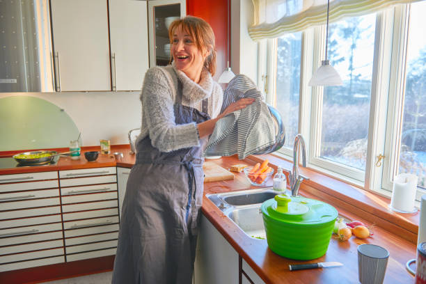 istock Housewife having fun preparing a meal 643583530