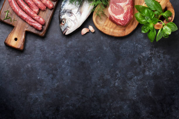 istock Sausages, fish and meat cooking 643584068