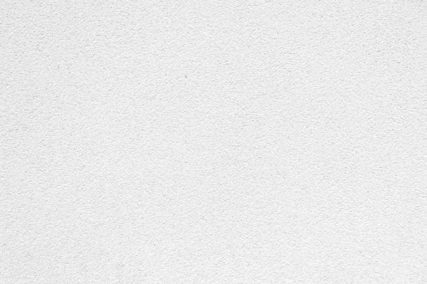 istock detail of rough white plaster wall texture 643584322