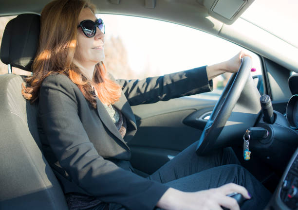istock Woman in car 643591494