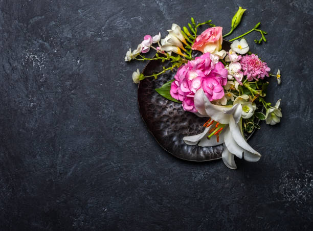 istock Festive flower composition the black background 643598294