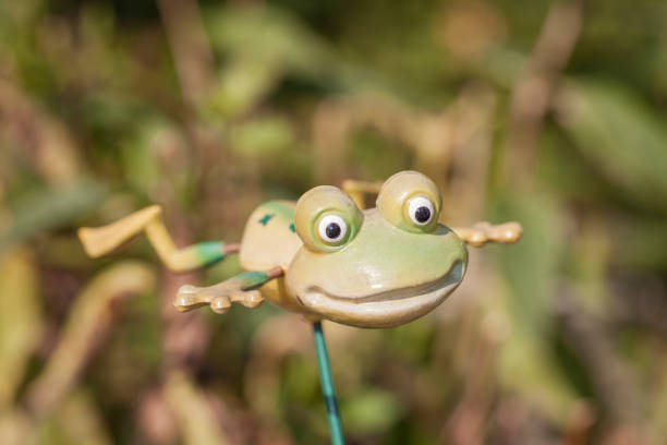 istock artificial frog on a stick, garden decoration 643601688