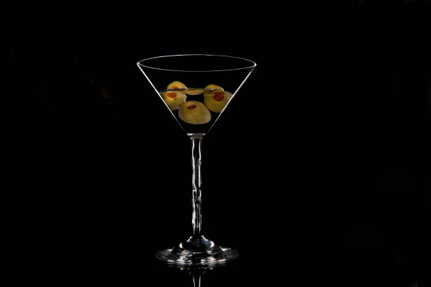 istock woman's drink, martini glass 643603498