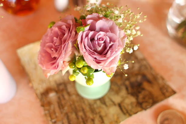 istock Beautiful pink roses bouquet in vase 643606892
