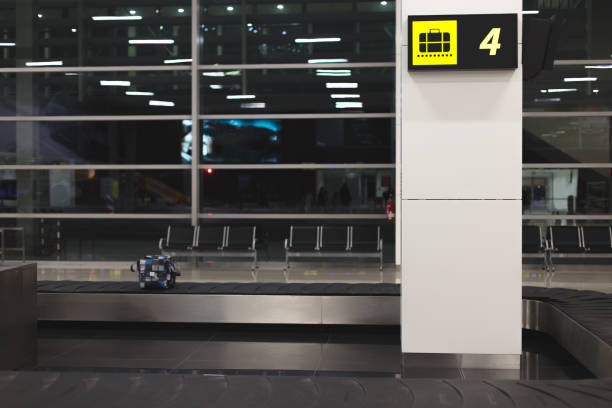istock carousel belt at airport with a bag on it 643635582