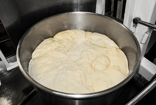 Fresh raw bread dough ready for baking