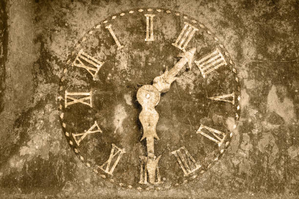 istock Vintage rusty clock in front of a stone background 643637774