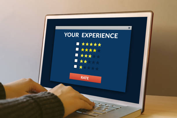 istock Customer review concept on laptop computer screen on wooden table 643640082