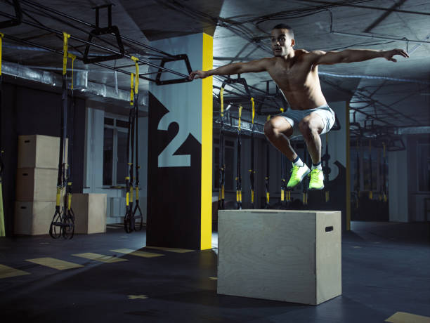 istock Gym training: Male athlete in action 643640146