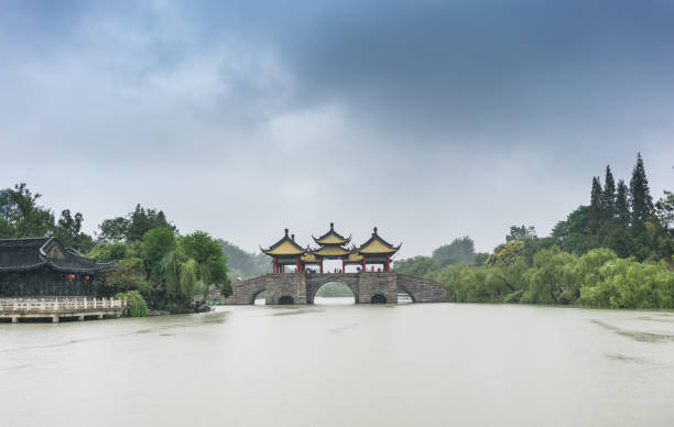 istock Floating on slender west lake on a rainy day 643648086