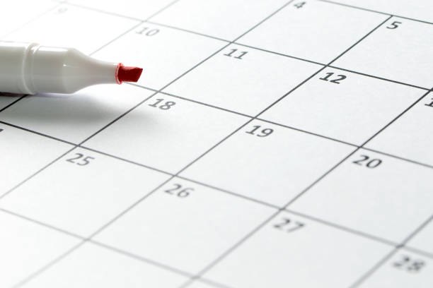 istock Red marker pen and calendar 643648192