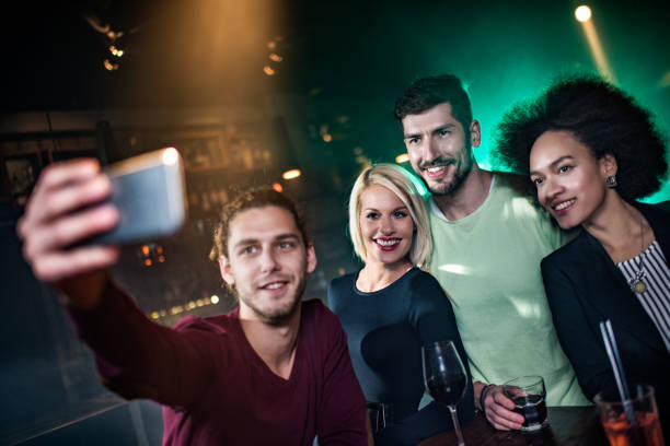 istock Group of people making a selfie 643655370