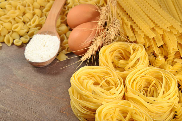 istock Uncooked Italian pasta, flour and eggs 643656374