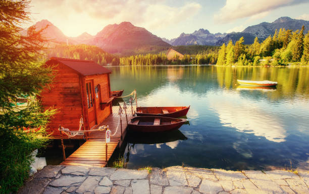 istock Boat on the dock surrounded by mountains at sunset. Fantastic Sh 643658948
