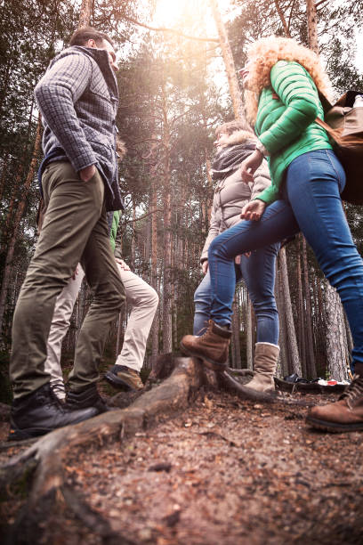 istock Group of friends into wood 643659086
