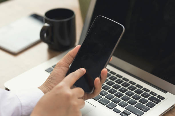 istock Businesswoman using smart phone 643659934