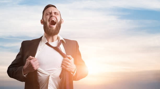 istock Business man screaming with open chest for text 643660214