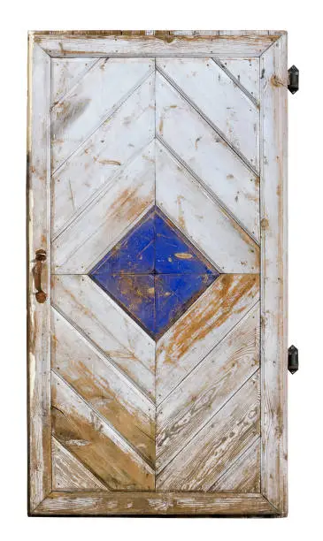 Handmade old locked white wooden door isolated