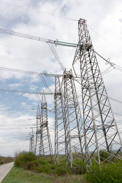 istock High voltage pylons on the background of sky with clouds. 643678780