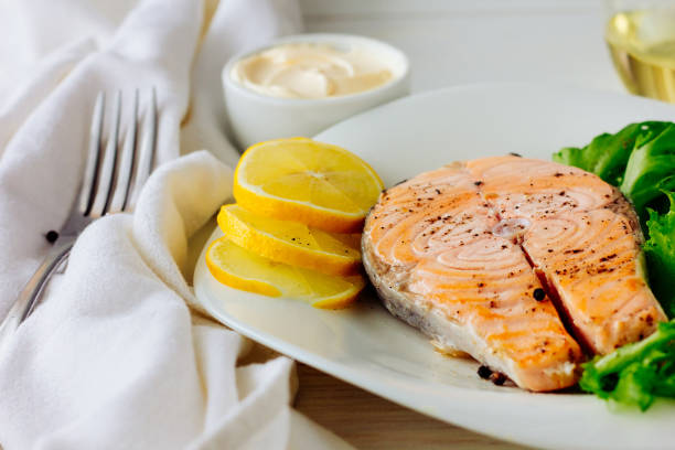istock Baked salmon with lemon 643678980