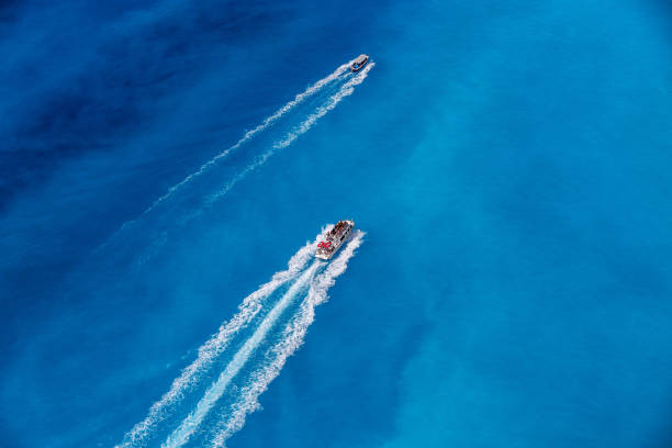 istock Boats in the blue sea 643679126
