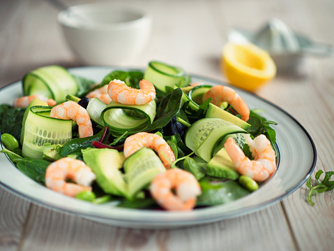 Home made healthy oriental style king prawn,avocado,cucumber,edamame beans,baby spinach and edamame beans, sesame seed soy sauce for dressing.