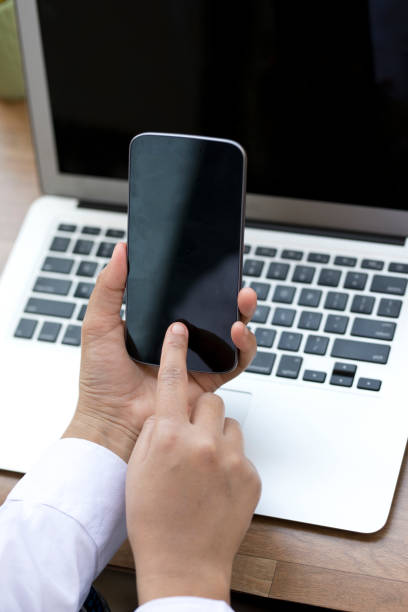 istock Businesswoman using smart phone 643682700
