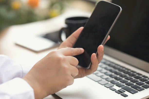 istock Businesswoman using smart phone 643682802