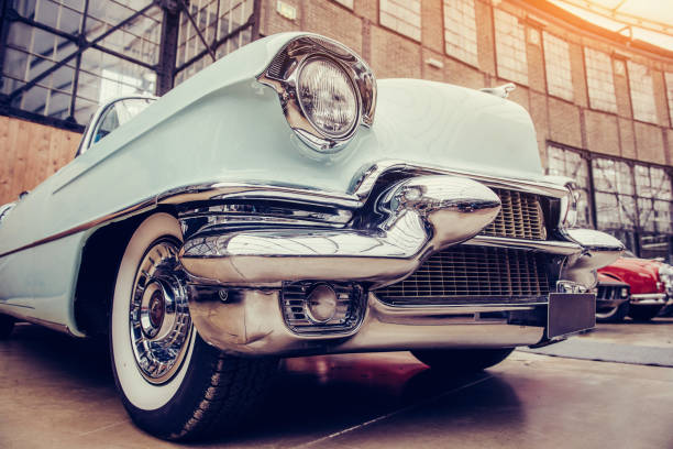 istock classic car. Beautiful retro style transport exhibition. 643687414