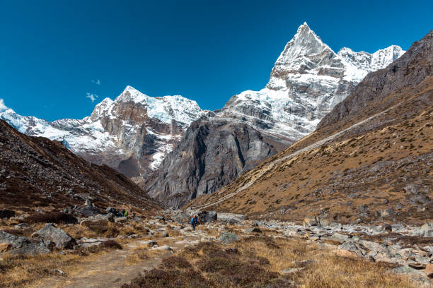 istock Flat Bottom of Valley and sharp high Peaks of Himalaya 643690600