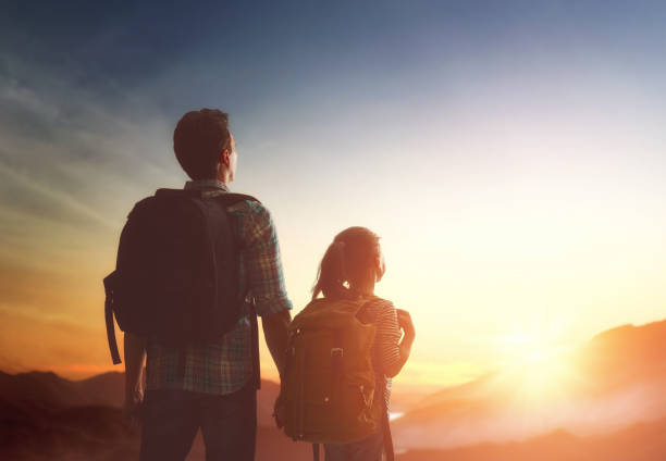 istock Kid and dad look at sunset 643693522
