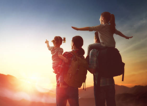 istock family at sunset 643693566