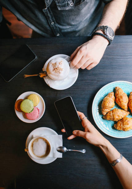 istock People having a coffee and sweets in the cafe 643695076