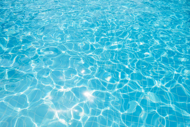 istock Beautiful ripple wave and blue water surface in swimming pool 643697694