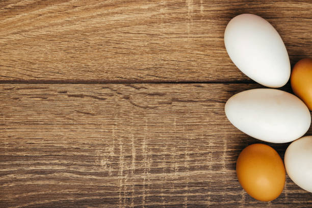 istock chicken eggs on wooden background 643697910