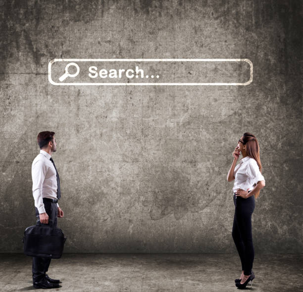 istock Business colleagues looking at web search icon 643699736