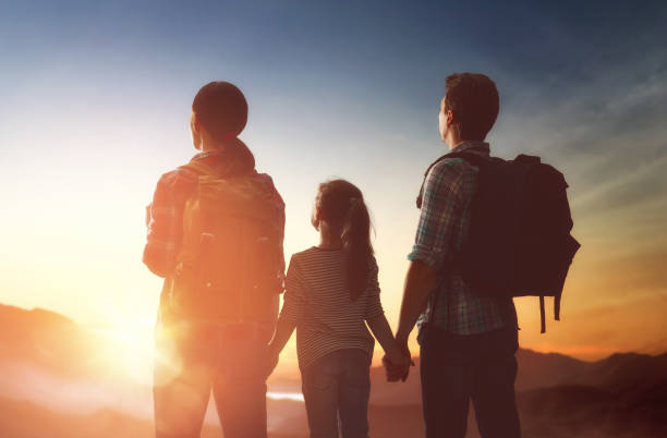 istock family at sunset 643704482