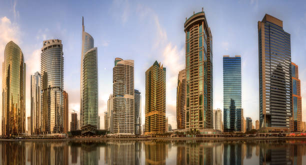 istock Panoramic view of Business bay and Lake Tower, reflection in a river, UAE 643707552